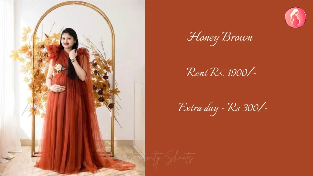 honey brown maternity gown with soft layered net and warm tones for studio maternity photoshoot