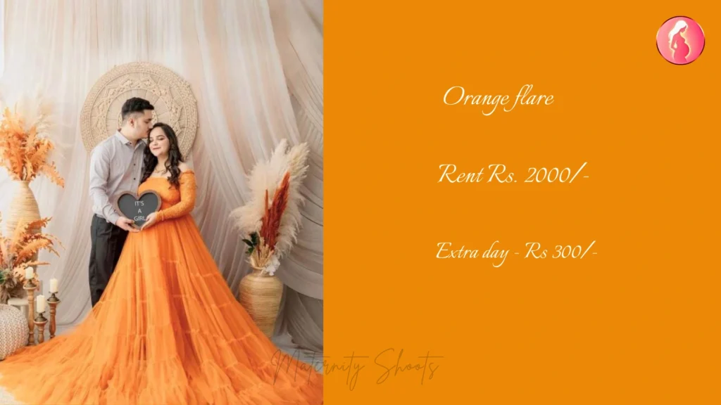 orange flare maternity gown with soft flowing skirt styled for warm couple maternity photoshoot