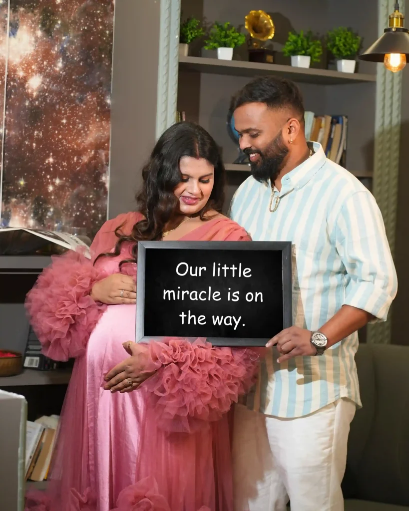 Couple maternity portrait during indoor studio maternity photoshoot in Jamshedpur wearing brown bodycon dress