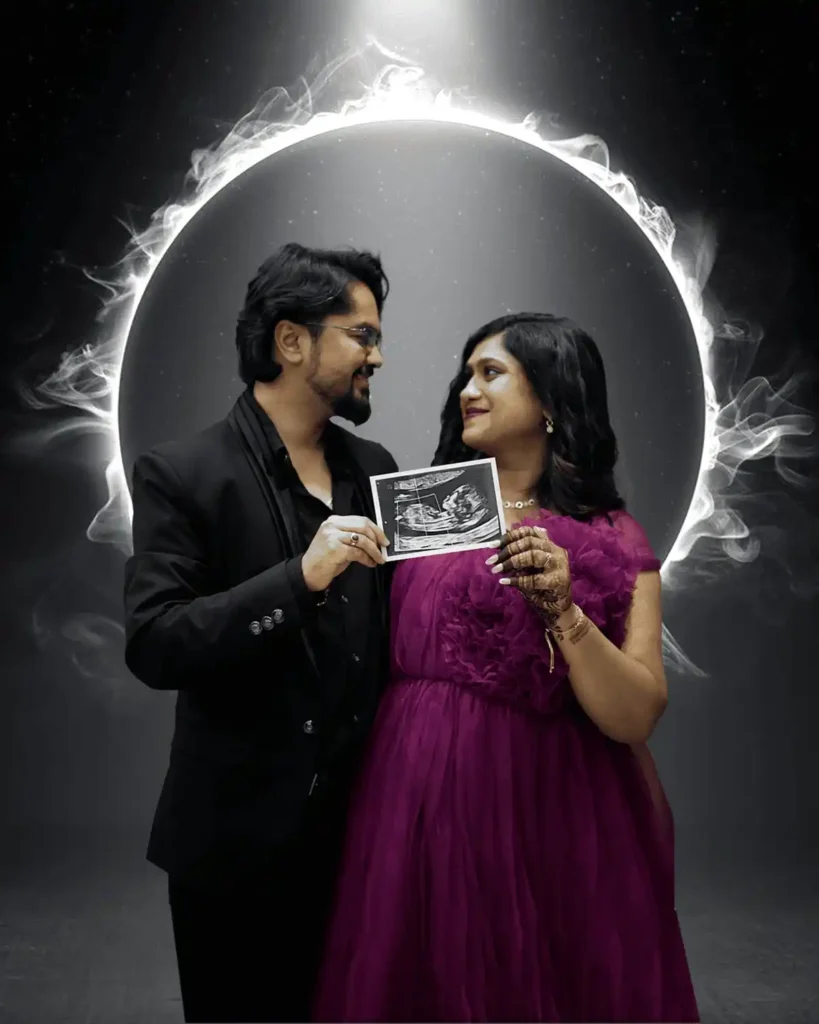 creative maternity photoshoot in Kolkata with couple holding ultrasound photo